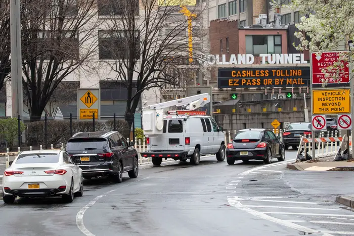 Cars make their way to New Jersey as they enter the Holland Tunnel from Canal Street in New York City on March 29th, 2020.